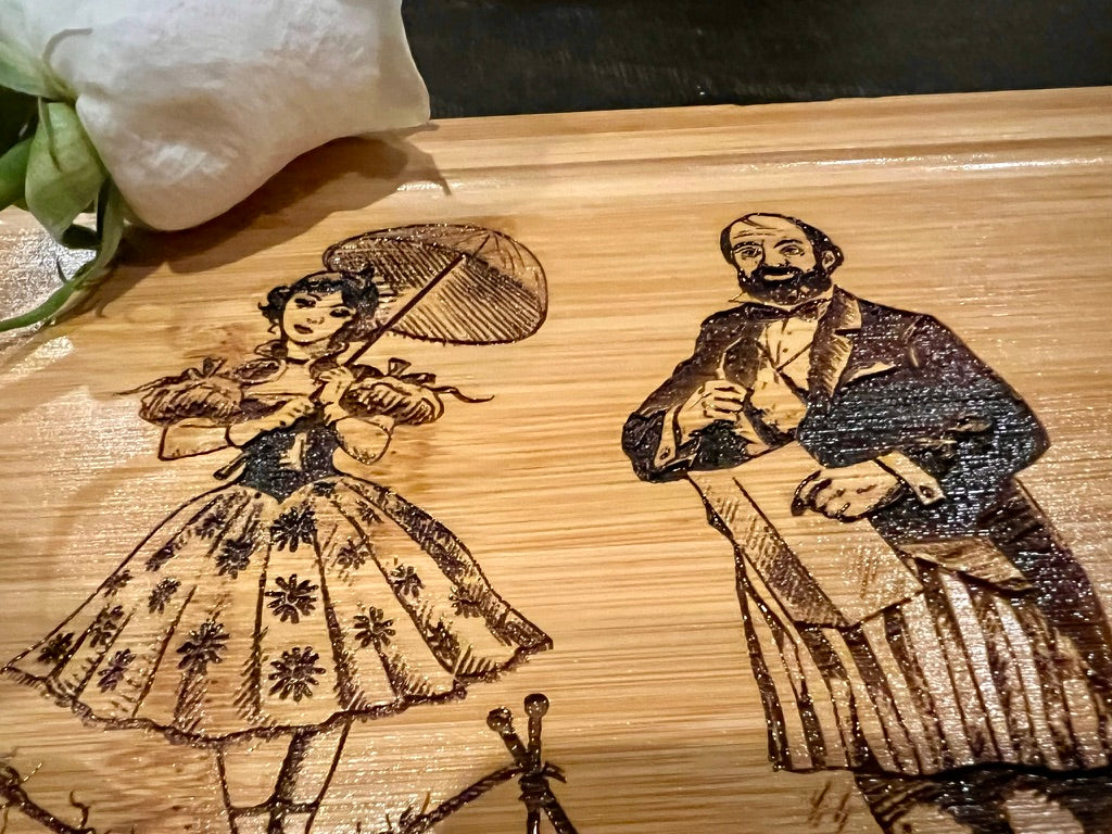 Cutting / Charcuterie Board - Haunted Stretching Portraits engraved on heavy duty bamboo