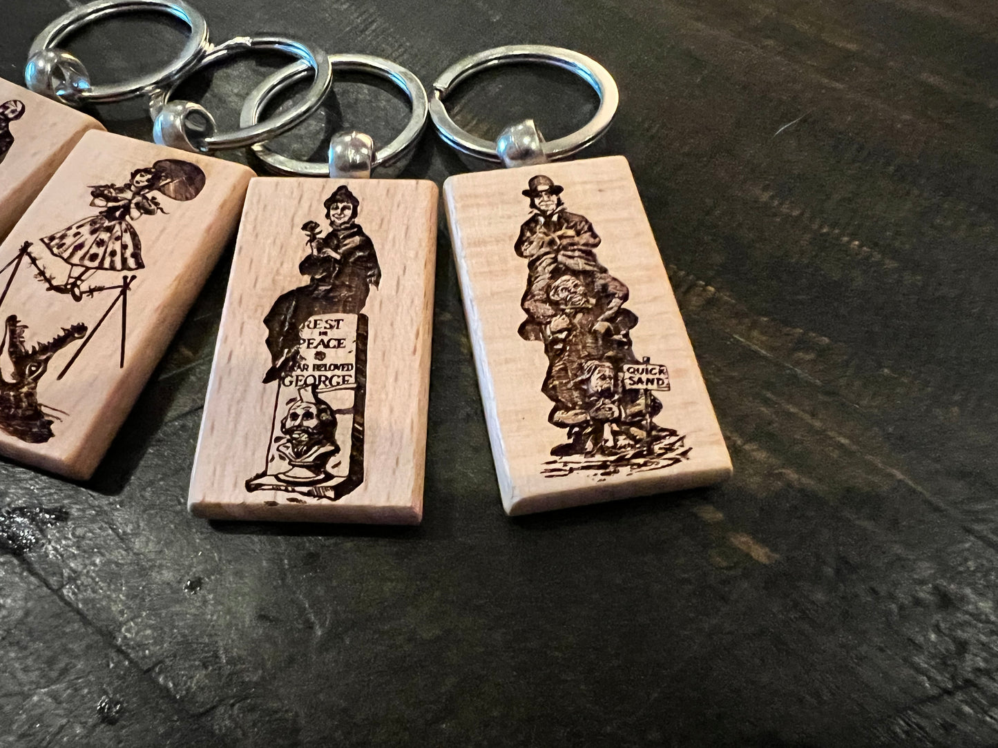 Keychain Set - Haunted Mansion Stretching Portraits (set of 4)