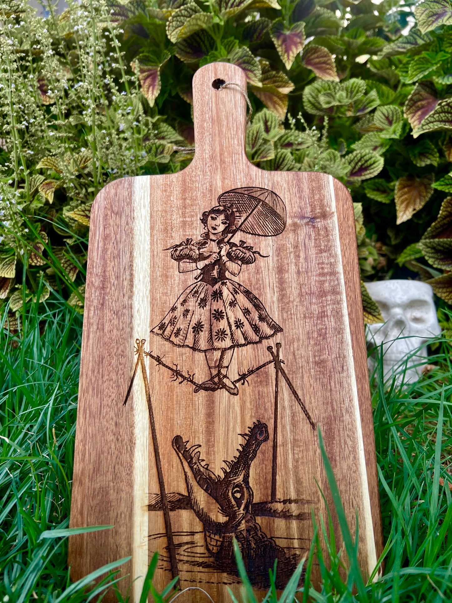 Charcuterie & Cutting Board - The Doomed Tightrope Walker from the stretching room!  Sally Slater 16” X 8” engraved on Acaci