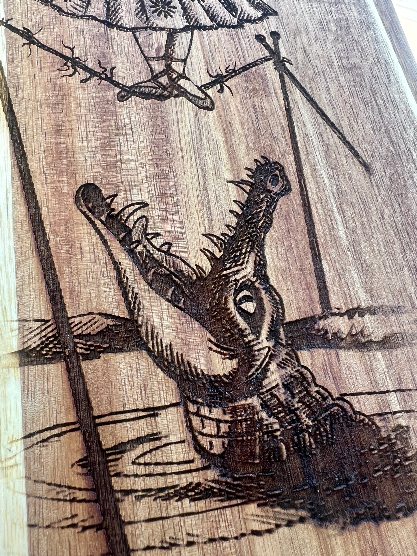 Charcuterie & Cutting Board - The Doomed Tightrope Walker from the stretching room!  Sally Slater 16” X 8” engraved on Acaci