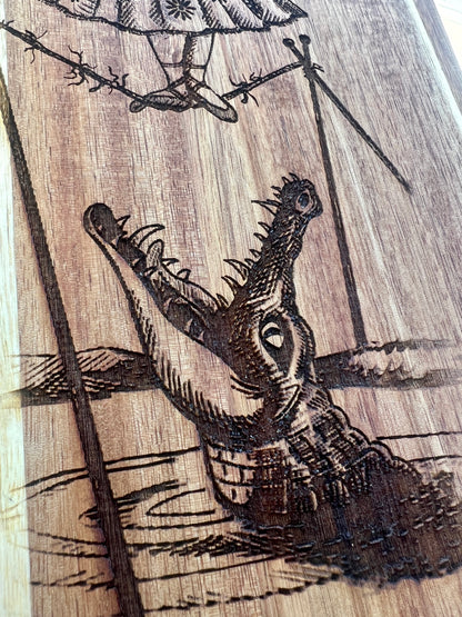 Charcuterie & Cutting Board - The Doomed Tightrope Walker from the stretching room!  Sally Slater 16” X 8” engraved on Acaci